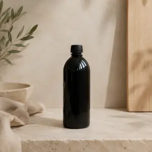 Botella de vidrio oscuro de 500 ml con tapón negro de rosca.
