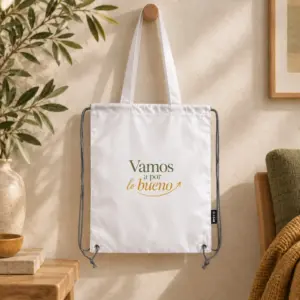 Bolsa Impulso en blanco, vista principal con diseño «Vamos a por lo bueno» en color.